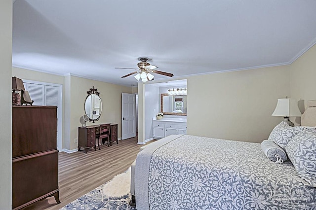 bedroom featuring ceiling fan, crown molding, baseboards, and wood finished floors