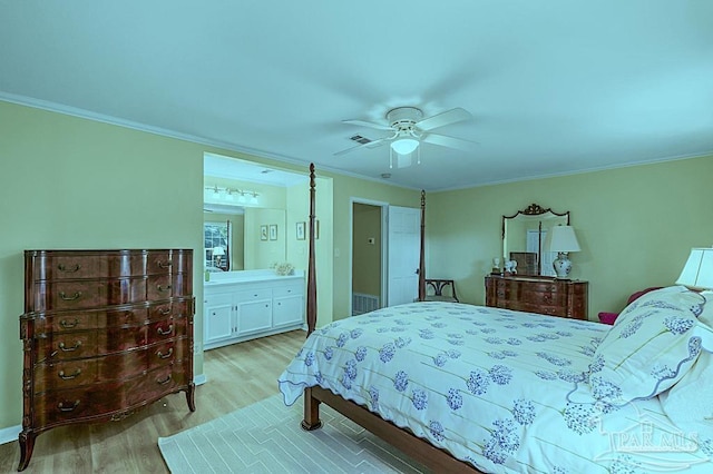 bedroom featuring visible vents, connected bathroom, ceiling fan, crown molding, and light wood-style floors