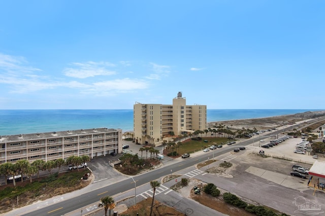 aerial view with a view of the beach and a water view