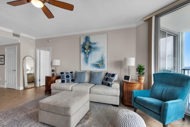 tiled living room with crown molding and ceiling fan