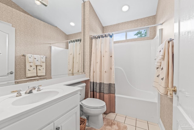 full bathroom with tile patterned flooring, vanity, vaulted ceiling, and shower / bathtub combination with curtain