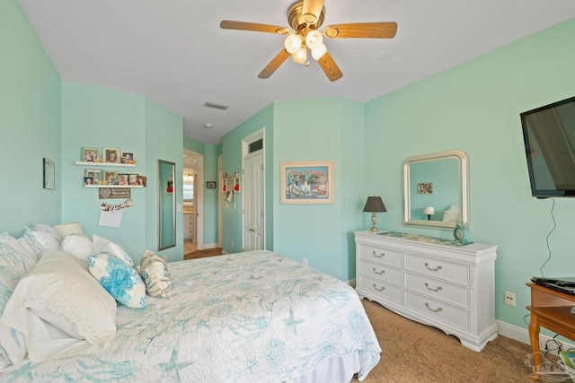 carpeted bedroom with ceiling fan