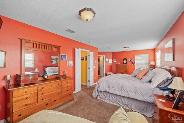 bedroom featuring carpet flooring