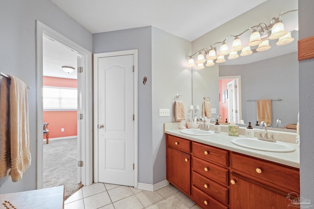 bathroom featuring tile patterned floors and vanity