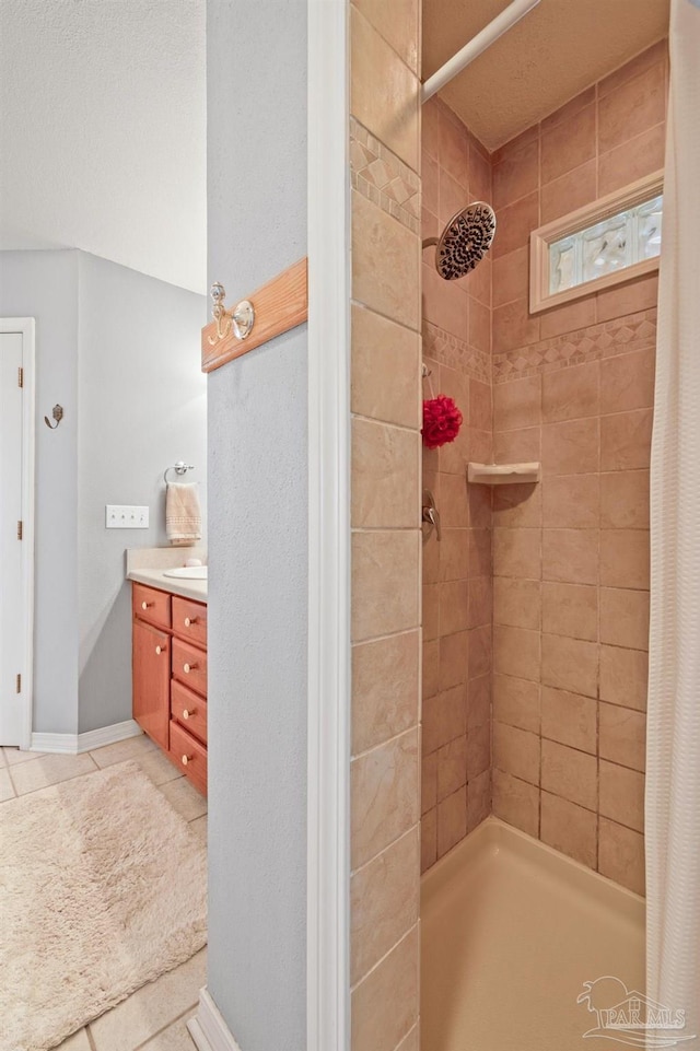 bathroom with vanity and a shower with shower curtain