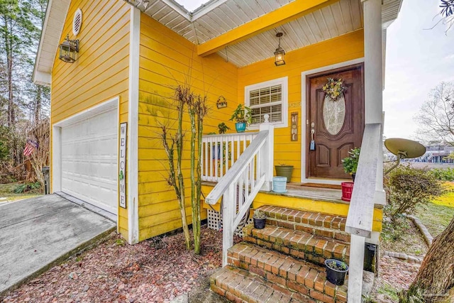 entrance to property featuring a garage