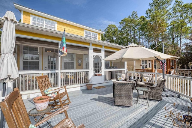 deck featuring a sunroom