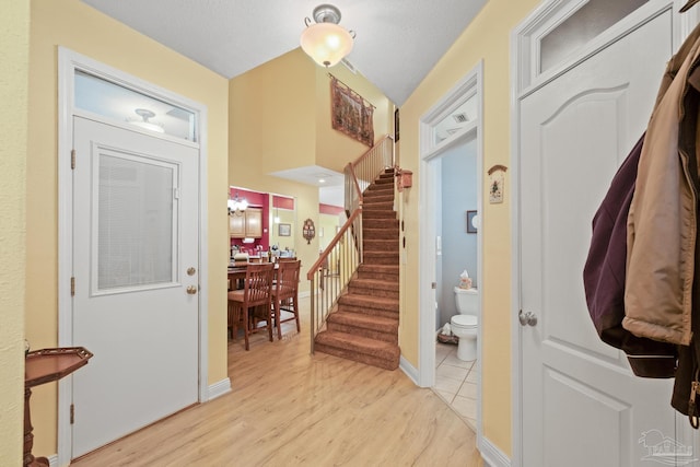 foyer with light wood-type flooring