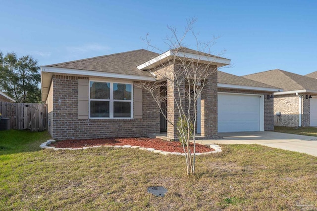 4616 Honor Guard Way, Crestview, FL 32539 - single story home featuring brick siding, driveway, a garage, and a shingled roof