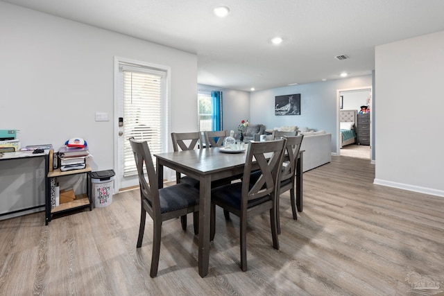 4616 Honor Guard Way, Crestview, FL 32539 - dining space featuring light wood finished floors and recessed lighting
