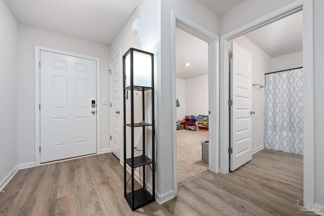 4616 Honor Guard Way, Crestview, FL 32539 - entrance foyer featuring wood finished floors and baseboards