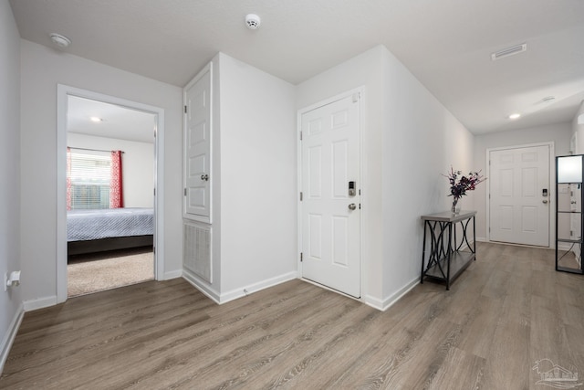 4616 Honor Guard Way, Crestview, FL 32539 - foyer entrance featuring light wood finished floors and recessed lighting