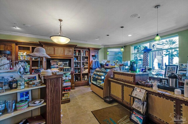 miscellaneous room featuring light tile patterned floors and ornamental molding