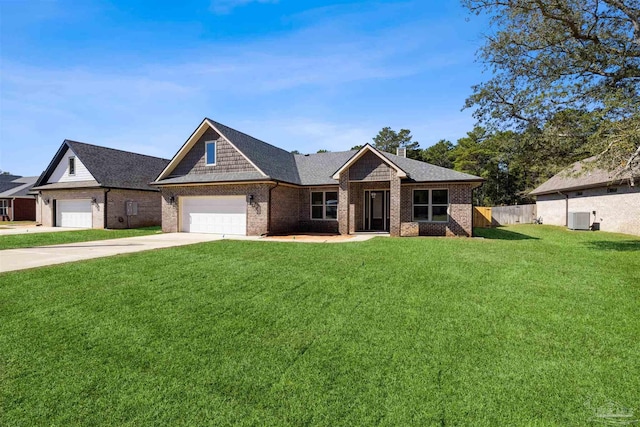 view of front of home featuring brick siding, concrete driveway, fence, cooling unit, and a front lawn