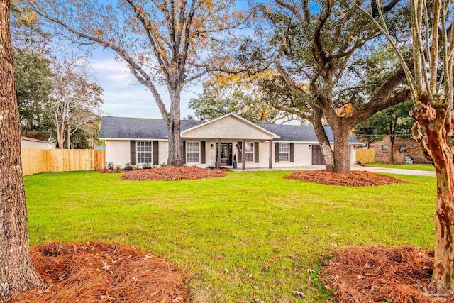 single story home with a front yard