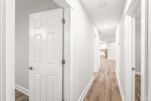 hall featuring light wood-type flooring