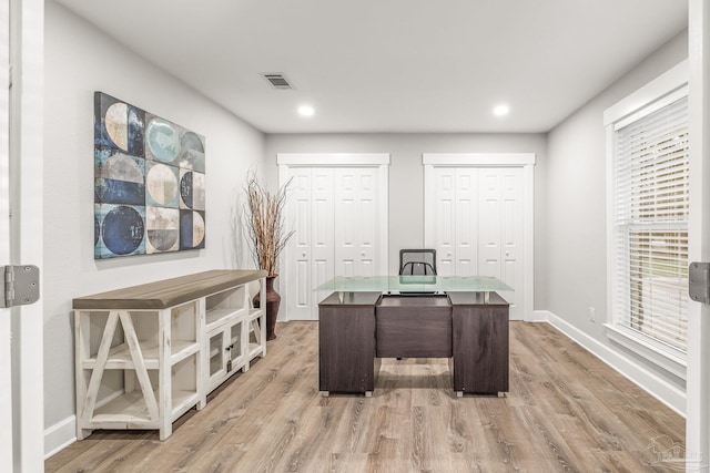 office with hardwood / wood-style flooring