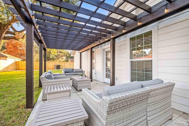 view of patio featuring an outdoor living space and a pergola