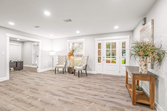 living area with light wood-type flooring