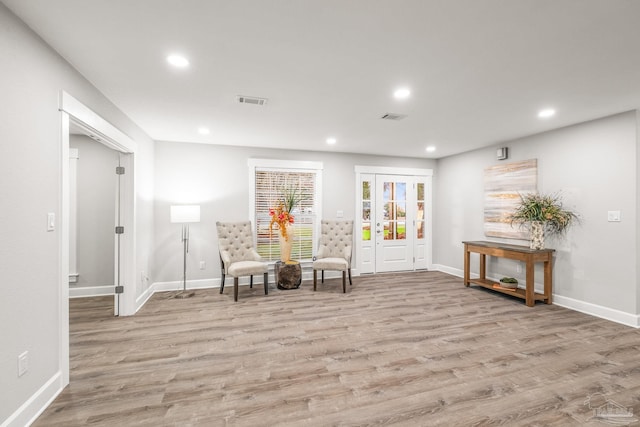 unfurnished room featuring light hardwood / wood-style flooring