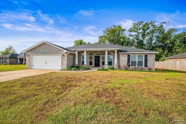 ranch-style home featuring fence, a front yard, brick siding, concrete driveway, and an attached garage