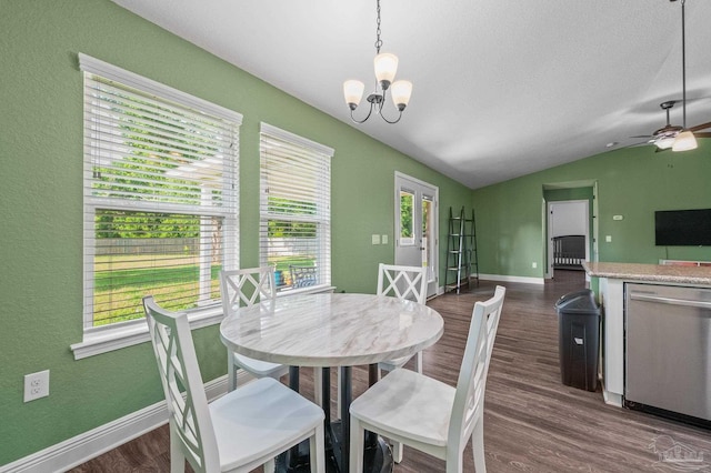 4036 Millwright Way, Pace, FL 32571 - dining space with baseboards, dark wood-style floors, lofted ceiling, and ceiling fan with notable chandelier