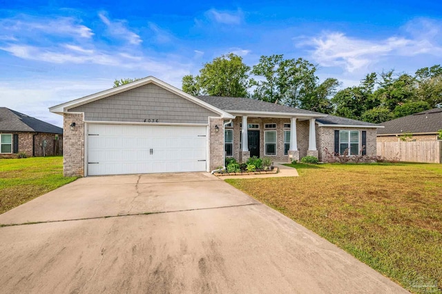 single story home featuring fence, a front yard, brick siding, concrete driveway, and an attached garage