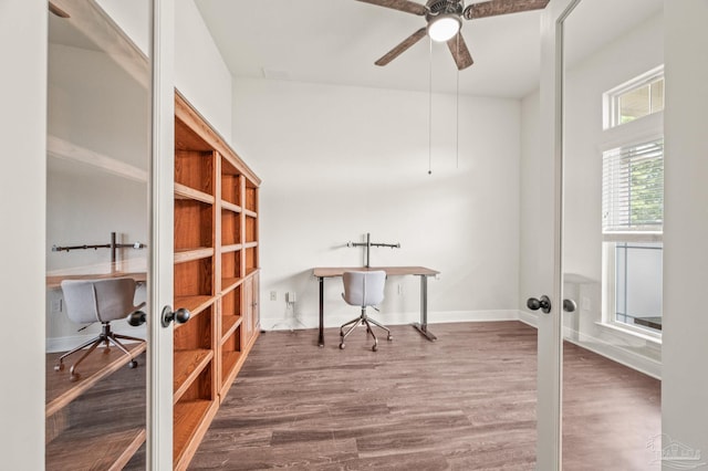 office area featuring a ceiling fan, baseboards, french doors, and wood finished floors