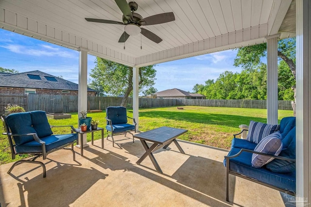 view of patio featuring a fenced backyard and ceiling fan
