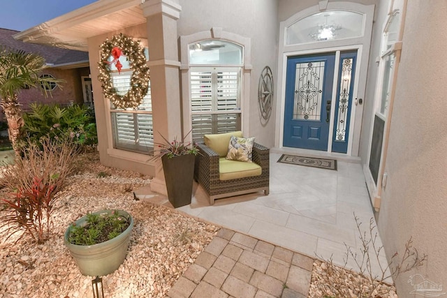 doorway to property featuring covered porch