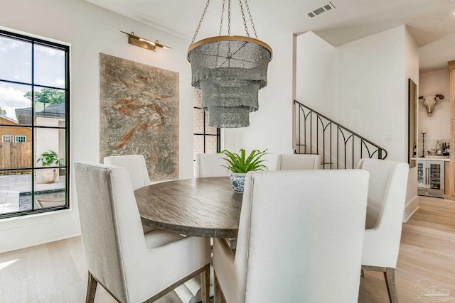 dining room with light hardwood / wood-style floors