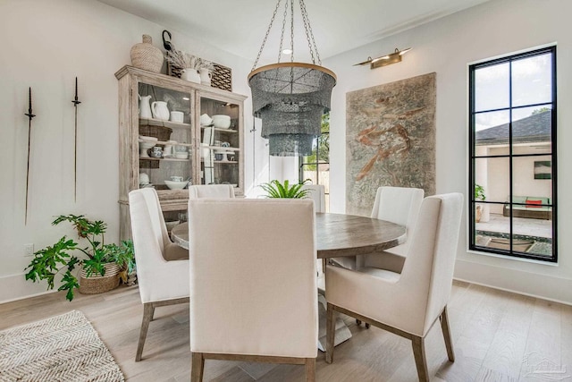 dining room featuring light hardwood / wood-style floors