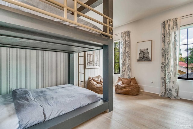 bedroom with wood-type flooring