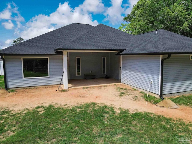 1758 Tate Rd, Cantonment, FL 32533 - back of property featuring a shingled roof and a patio