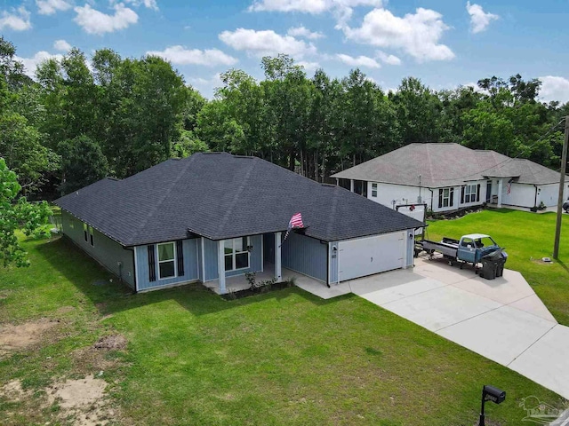 1758 Tate Rd, Cantonment, FL 32533 - ranch-style home with a shingled roof, a garage, driveway, and a front yard