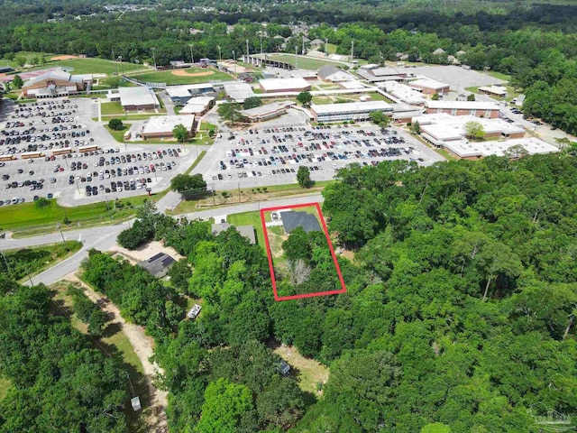 1758 Tate Rd, Cantonment, FL 32533 - aerial view of property's location featuring a heavily wooded area and property parcel outlined