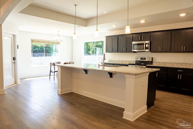 1758 Tate Rd, Cantonment, FL 32533 - kitchen featuring stainless steel appliances, a sink, recessed lighting, dark wood-style floors, and a chandelier