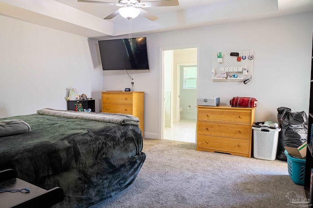 1758 Tate Rd, Cantonment, FL 32533 - bedroom with carpet floors, a tray ceiling, and a ceiling fan