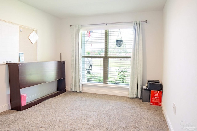 1758 Tate Rd, Cantonment, FL 32533 - unfurnished bedroom featuring carpet and baseboards