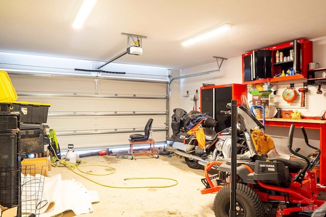 1758 Tate Rd, Cantonment, FL 32533 - garage featuring a garage door opener