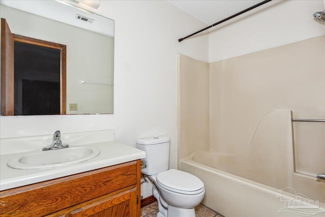 full bathroom with vanity, toilet, and tub / shower combination