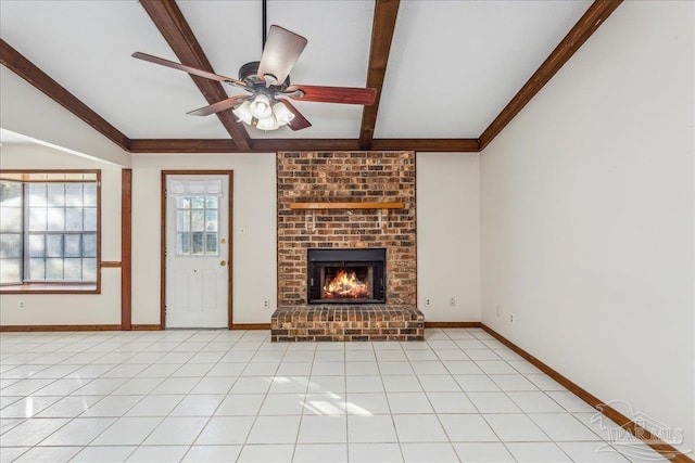 unfurnished living room with light tile patterned floors, ceiling fan, beamed ceiling, and a brick fireplace