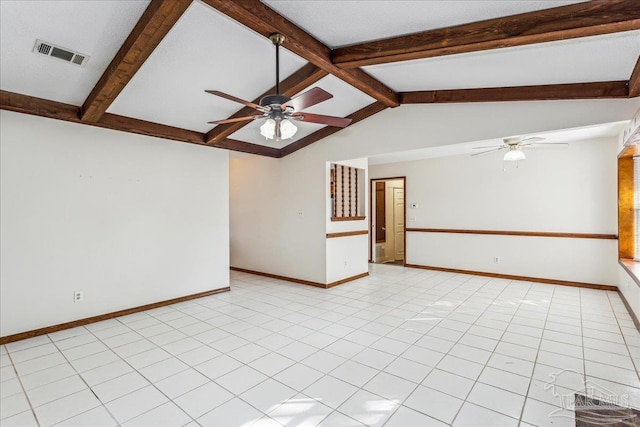 tiled empty room featuring vaulted ceiling with beams and ceiling fan