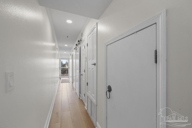 hall featuring light hardwood / wood-style floors