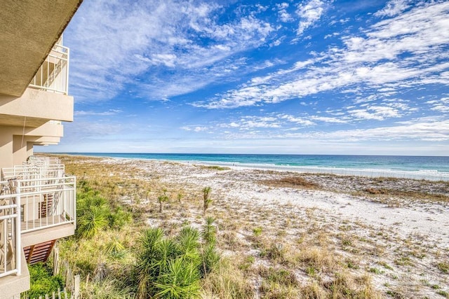 view of water feature with a beach view