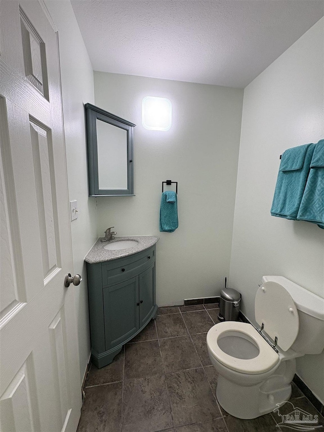 2654 Tinosa Cir, Pensacola, FL 32526 - bathroom with vanity and a textured ceiling