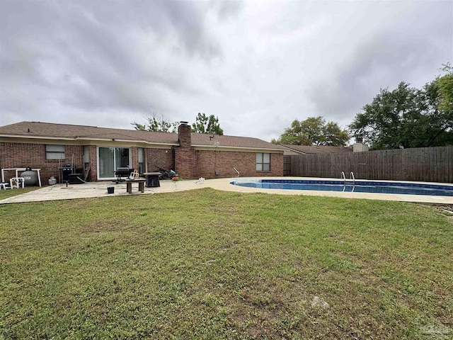 2654 Tinosa Cir, Pensacola, FL 32526 - fenced backyard featuring a patio