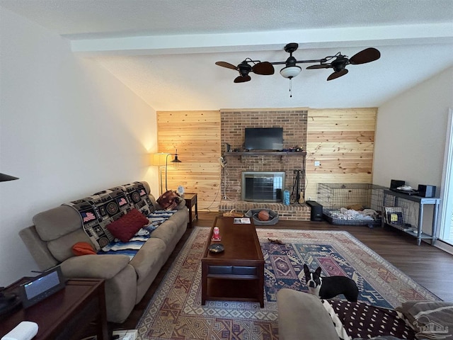 2654 Tinosa Cir, Pensacola, FL 32526 - living room featuring beamed ceiling, a ceiling fan, wood walls, and wood finished floors