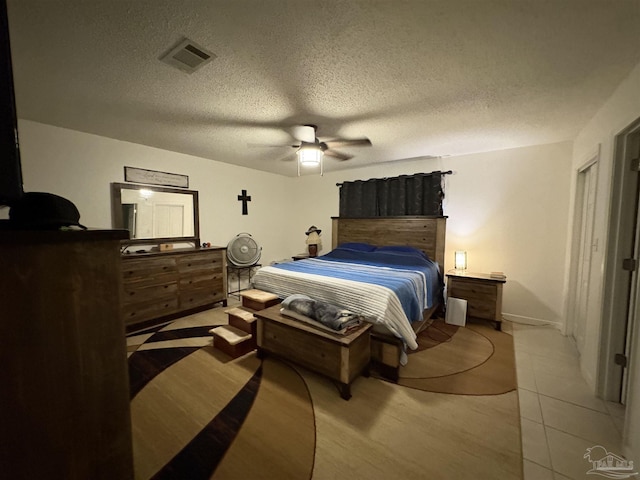 2654 Tinosa Cir, Pensacola, FL 32526 - bedroom with a ceiling fan and a textured ceiling