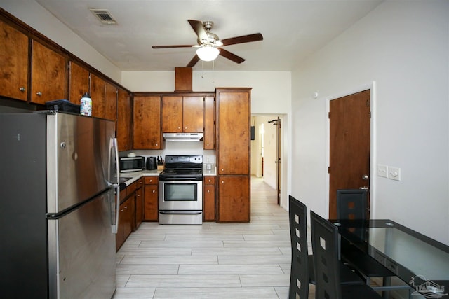 kitchen with ceiling fan, light hardwood / wood-style flooring, and stainless steel appliances